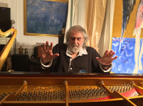 Vangelis on his piano 2b.png