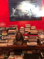 Vangelis' sculpture surrounded by his books in Paris 1.jpg